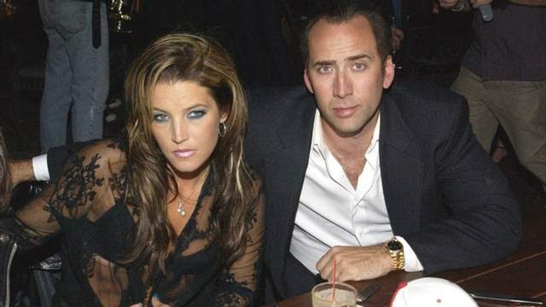 Николас Кейдж и Лиза Мари Пресли
Фото: Getty Images