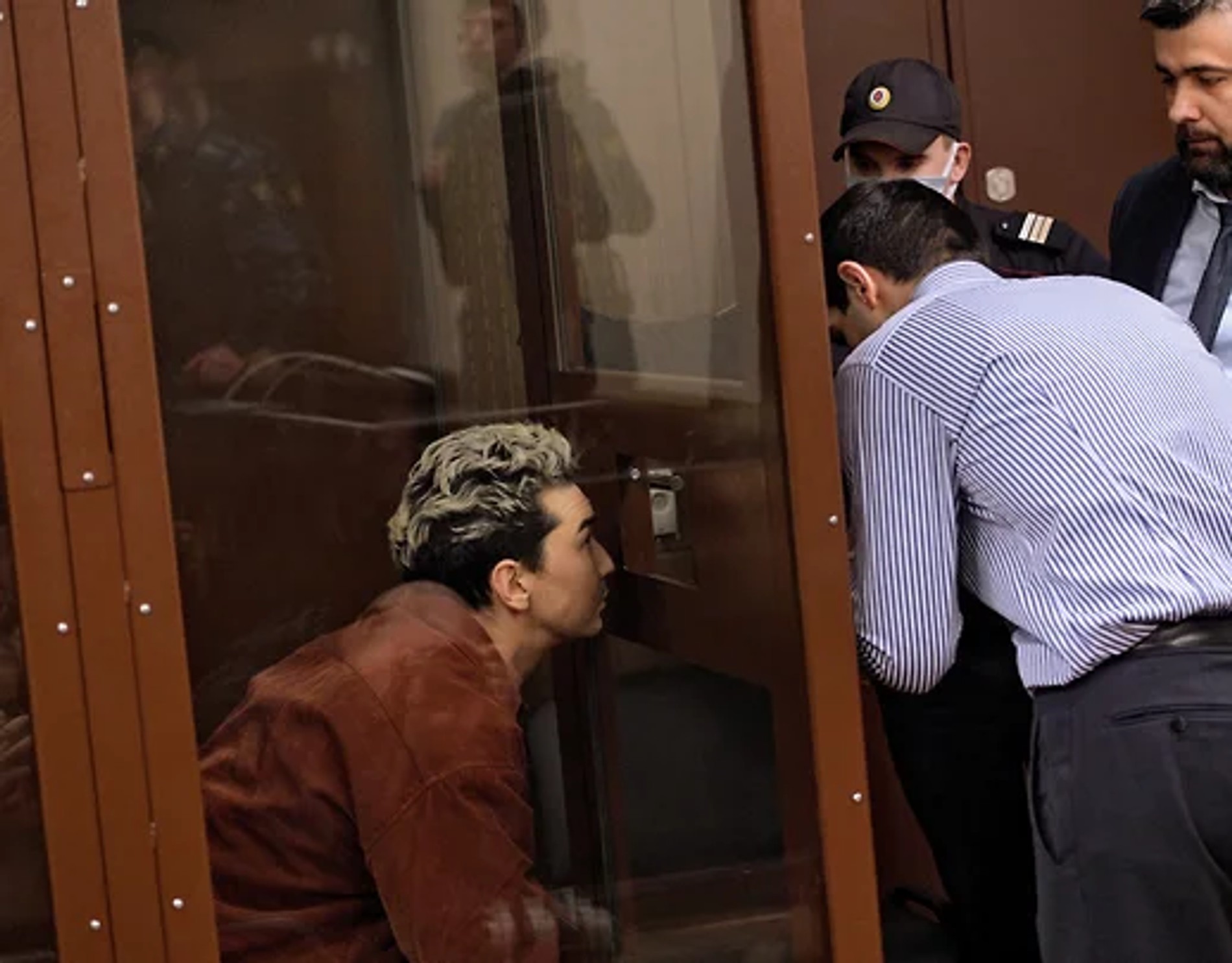 Ариан Романовский в зале суда
Фото: Коммерсантъ