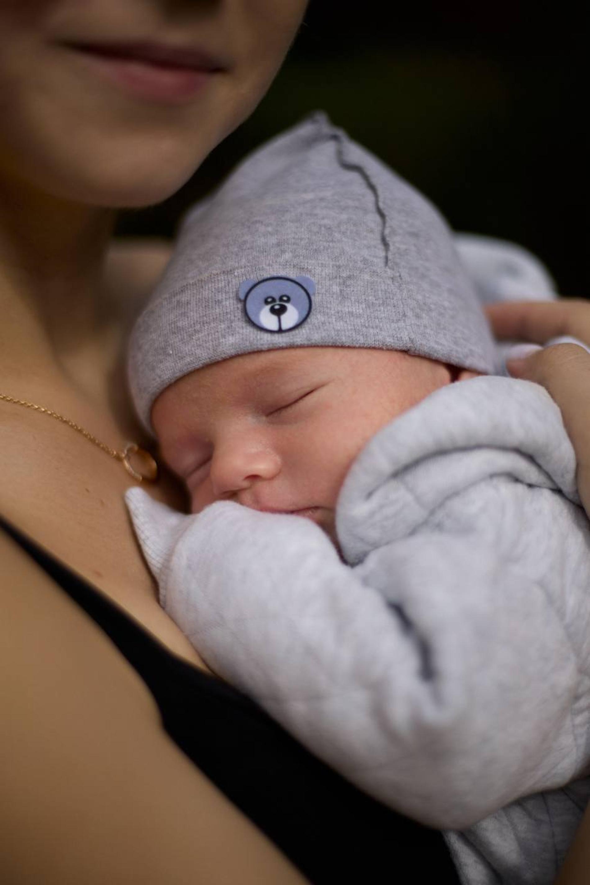 Александра Трусова с сыном. Фото: ТГ-канал avtrusovaofficial