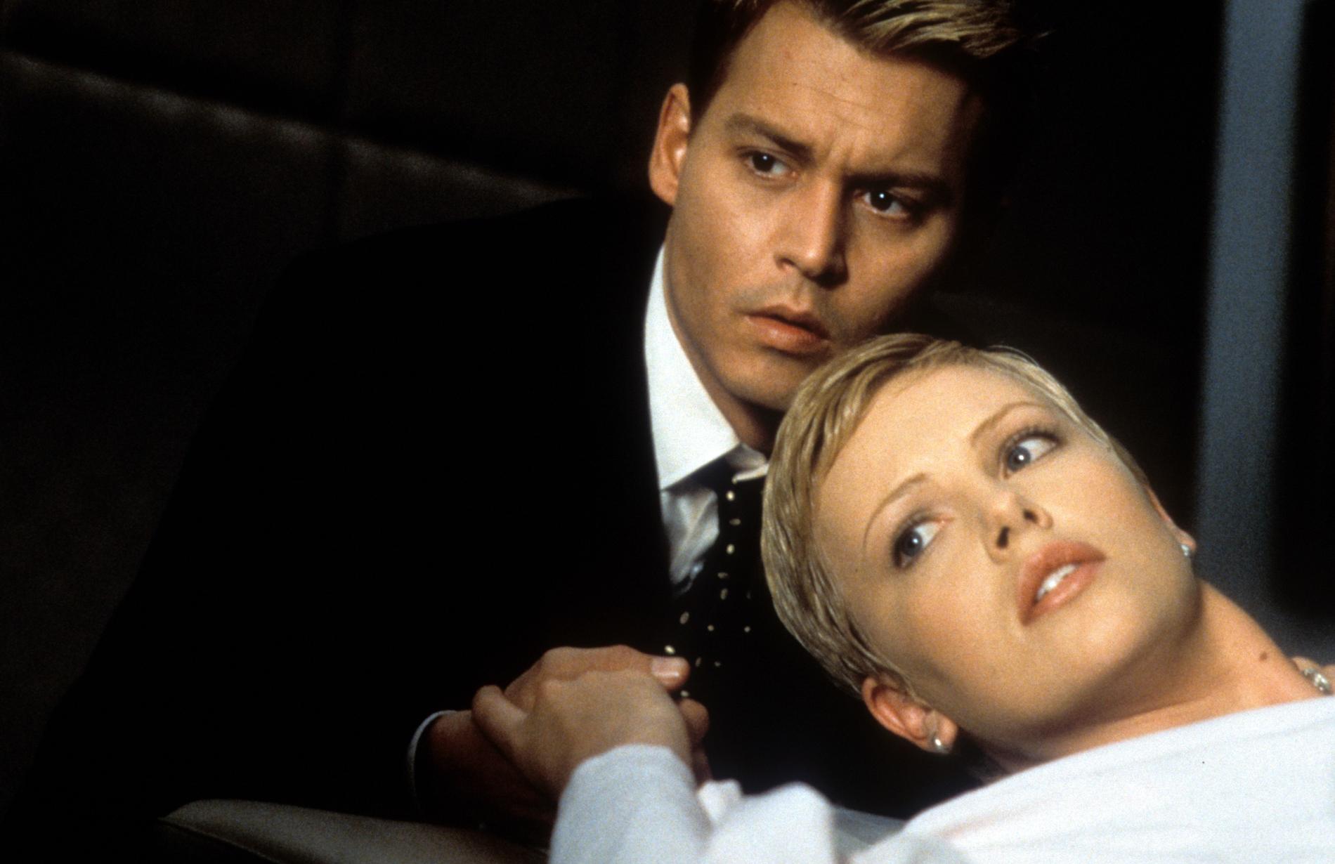 Джонни Депп и Шарлиз Террон. Фото: Getty Images